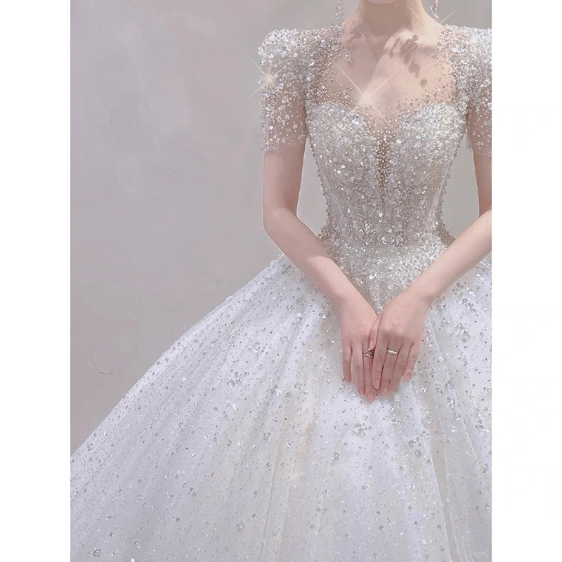 軽やかなウエディングドレス 花嫁 2025 ワンショルダー 半袖 感 小さな星空引きずり主糸 14,887円