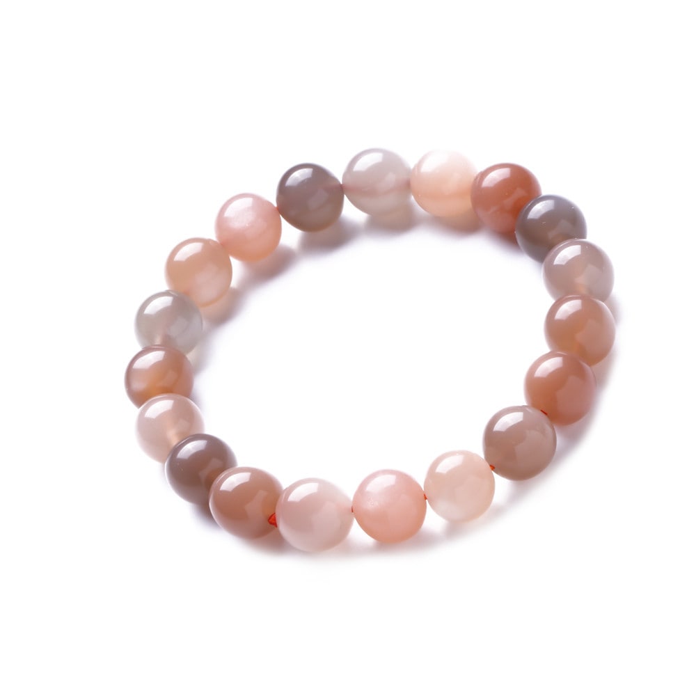 天然の月光石手鎖オレンジの日光石手のひ石水晶のクリスタル手でまかせた