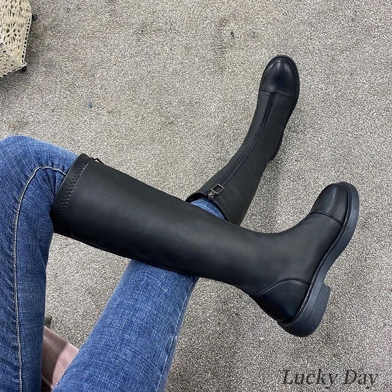 ロングブーツが復活！ロングブーツ女性新型韓国版ミリオンブーツファスナースリムブーツ厚底ダウン