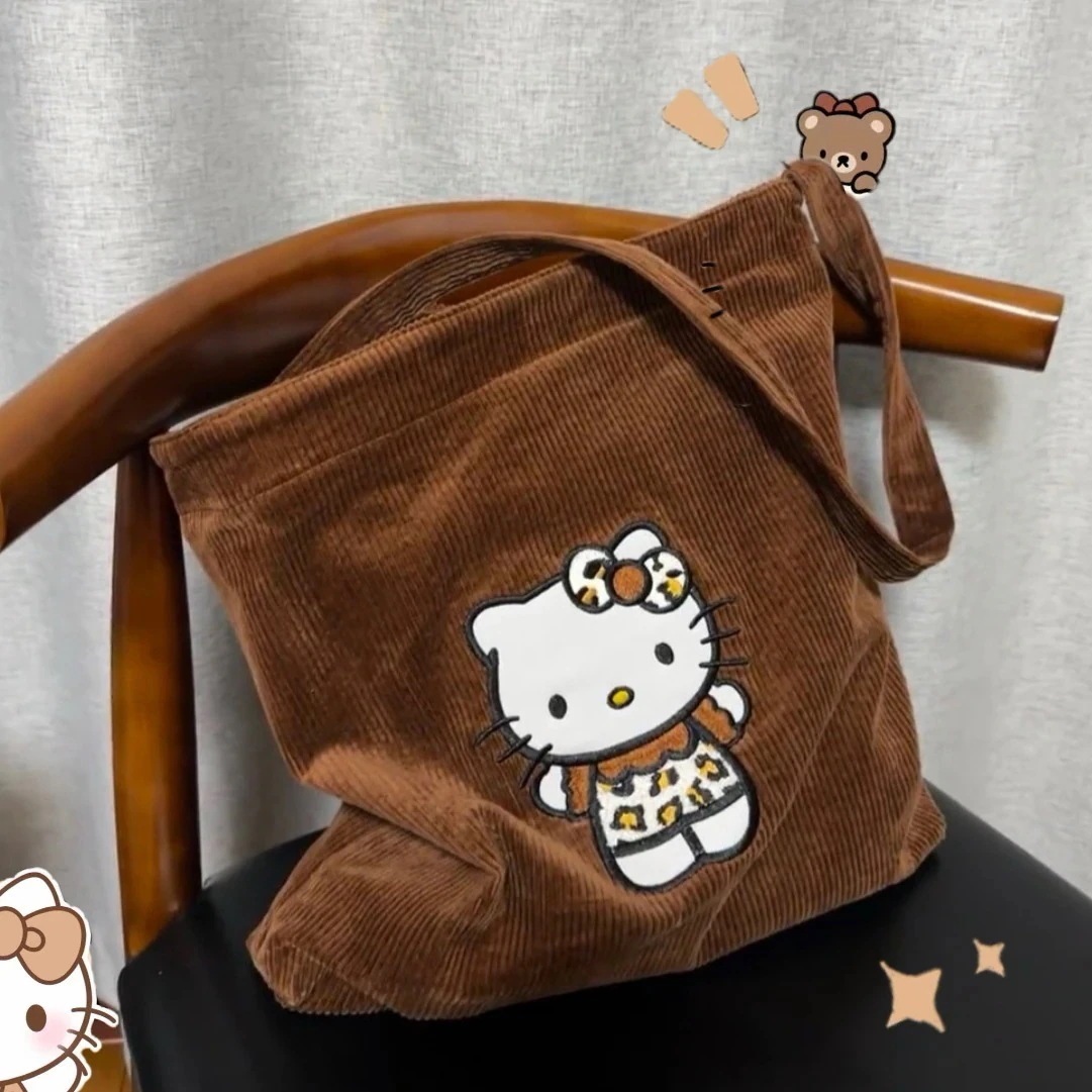 【2個買うと1個無料】日焼けキティ コーデュロイのハンドバッグ秋冬の乙女心斜めショルダーバッグ キティ大容量オールインワンショルダーバッグ 5,332円