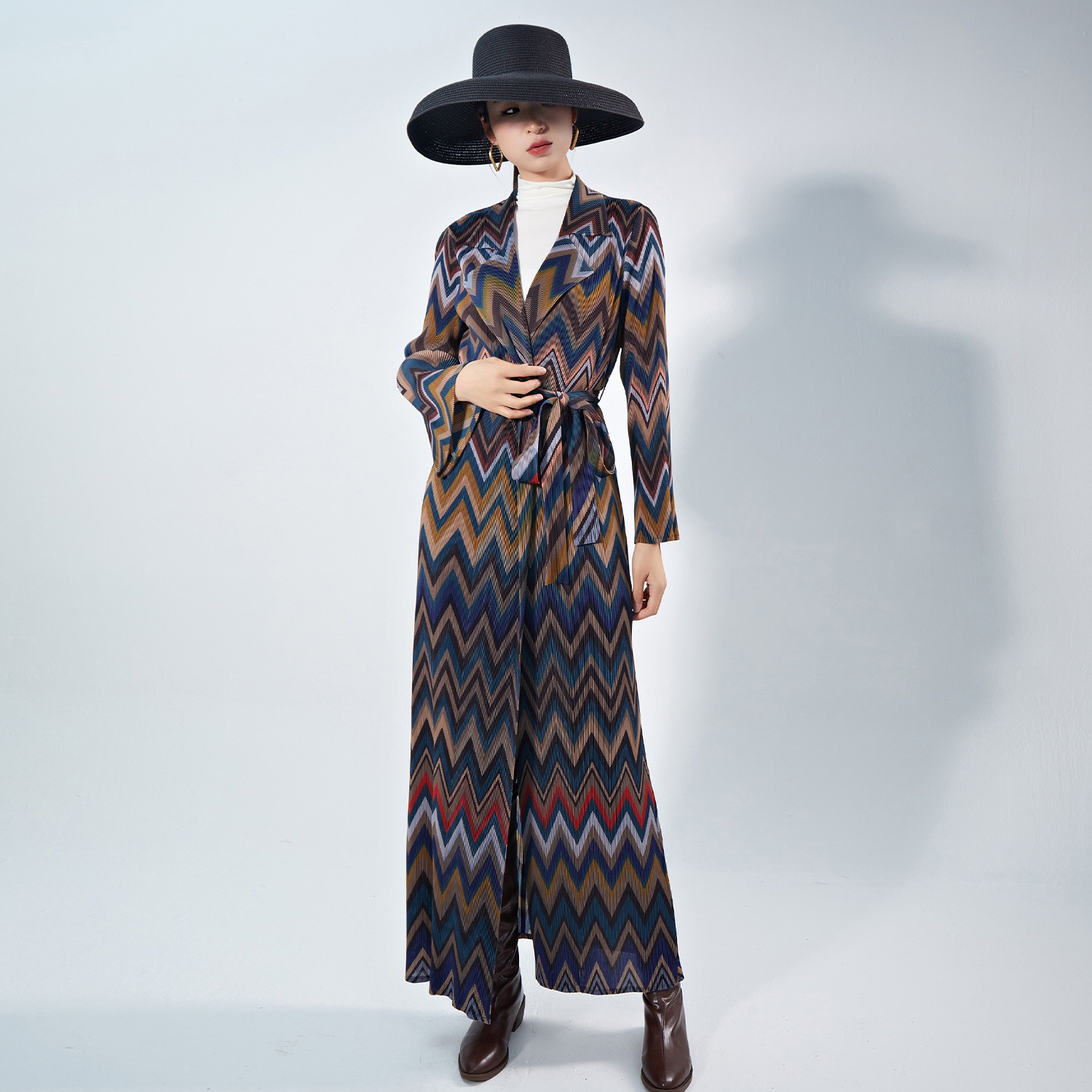 新しい中国風のしわの風の服のコートの婦人服の民族風のゆったりしたストラップのファッションの長い服の外はカーディガンを掛けます