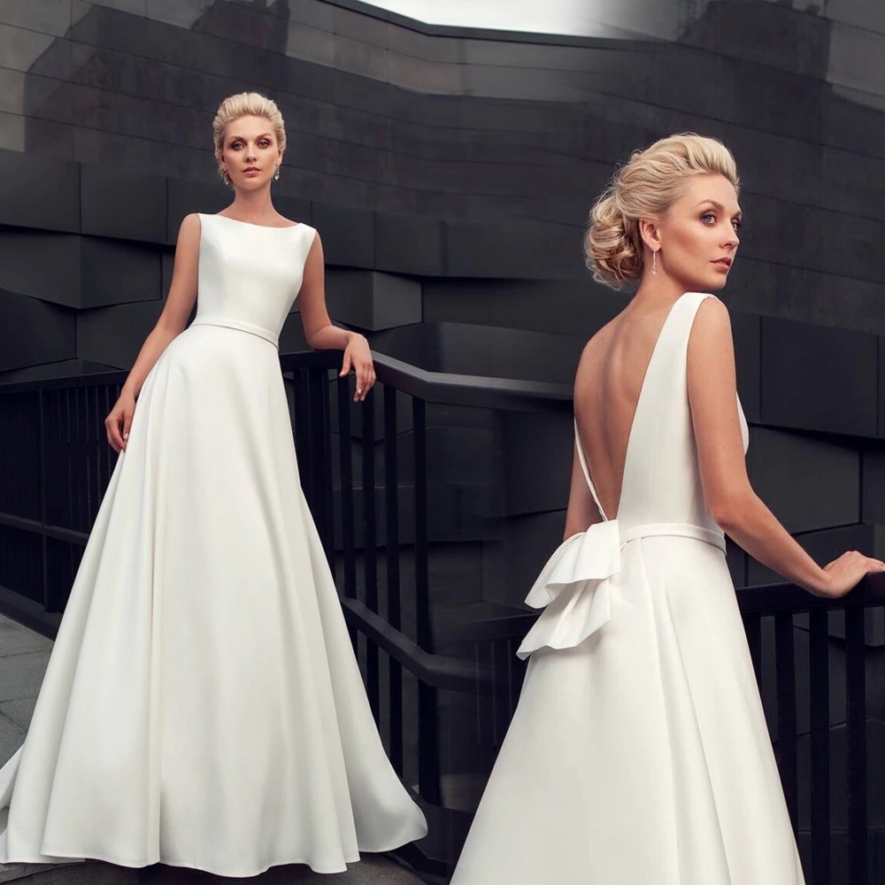 春の新型シンプルなサテンはやせて軽いウェディングドレスを見せます