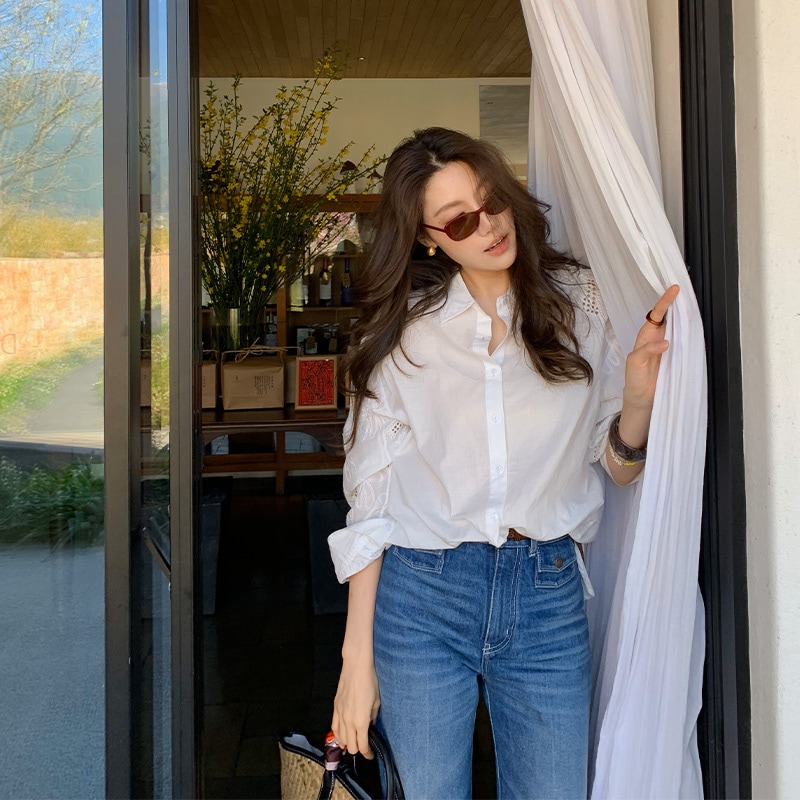 長いxierフランスの長袖の女性のための長袖の白いシャツ2025年春春新しい中空の高級光豪華な女性のトップ
