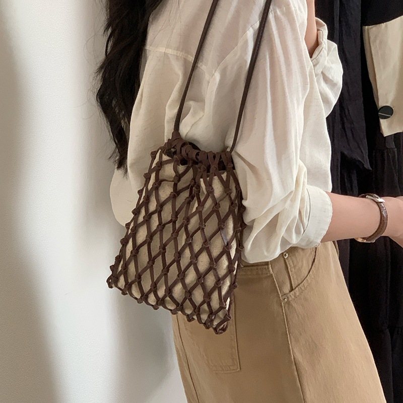 手編み斜め掛け網袋バッグ携帯バッグ女性2025新型ミニひも抜き福袋本革漁網バッグ