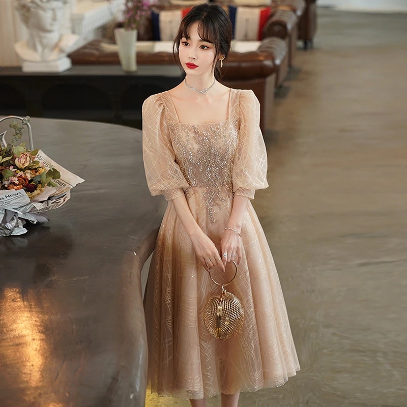 シャンパンカラーのイブニングドレス女性用高級感軽奢華ニッチおしゃれ成人式プリンセスドレス仙気漂うワンピース 5,549円