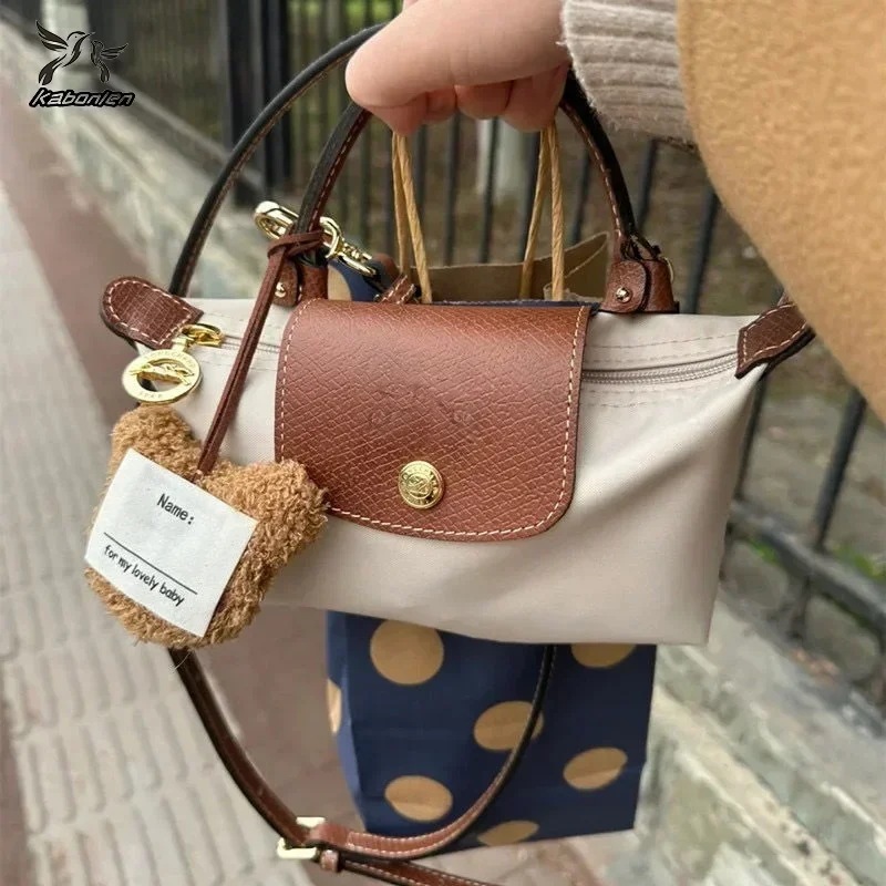 女性用ポータブルクロスオーバーバッグ,ミニ化粧品,ショルダーバッグ,フランスのファッション,ハンドヘルド,2023