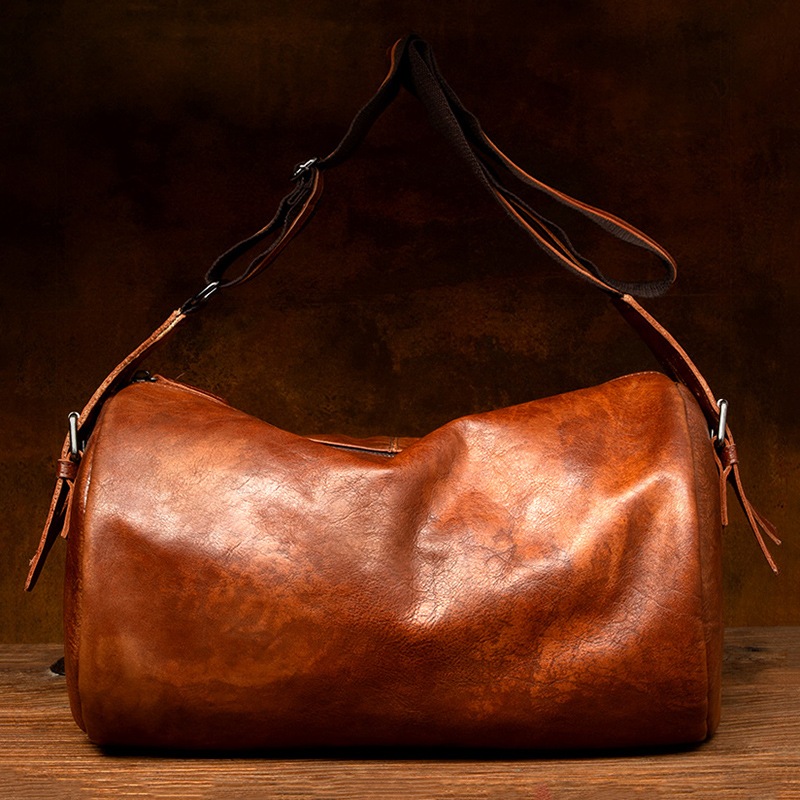 ゆっくりとした時間のレジャーの頭の層牛革の旅行鞄男性のリュックサック本革の片肩かばんコンピュータのハンドバッグ短い距離の荷物かばんです