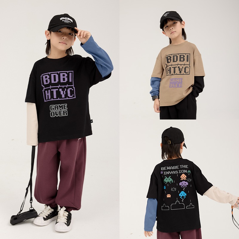 男の子長袖2025秋の新作フェイク長袖シャツ2枚子供カジュアルシャツカートゥーンプリントトップス