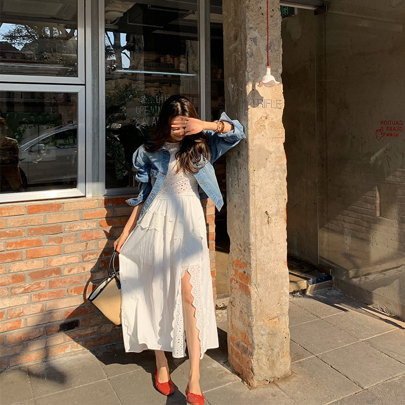 長いxier重工業中空刺繍入り白ドレス女性春と夏の不規則なフレンチレースミディアムレングススカート