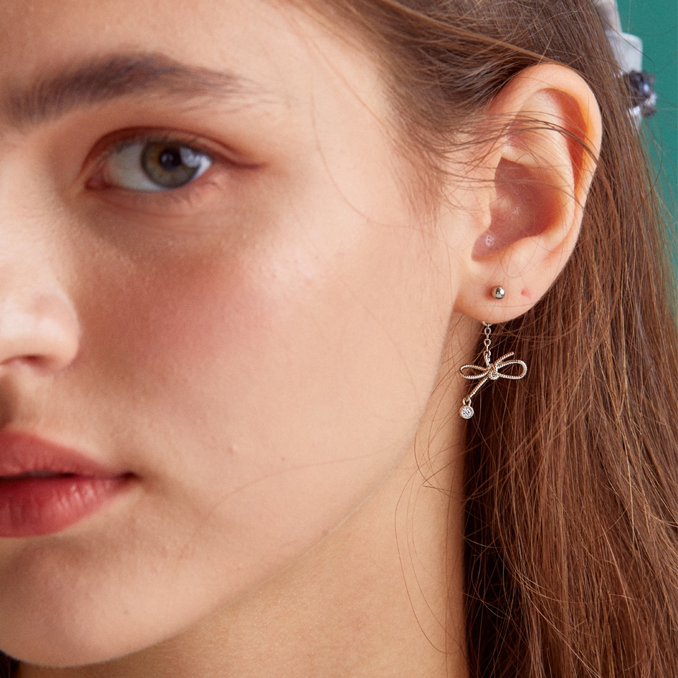 Knot ribbon drop surgical earring
