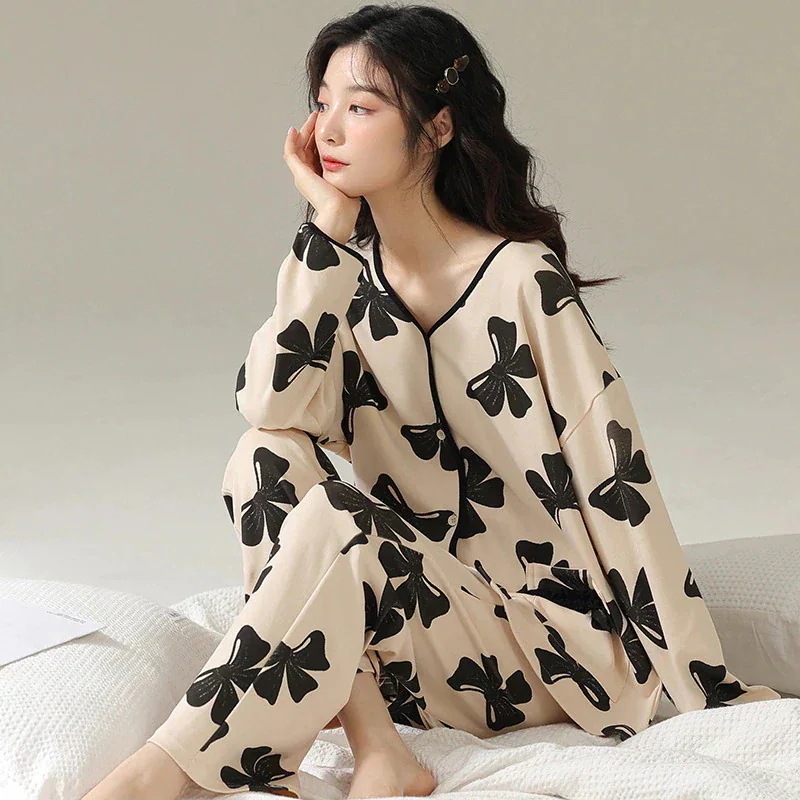 2023春服新作レディースルームウェアセットアップ綿100上質肌にやさしい韓国ファッションレディース部屋着長袖トップスロングパンツ上下二点可愛いスウィートで蝶結びプリント30%制限