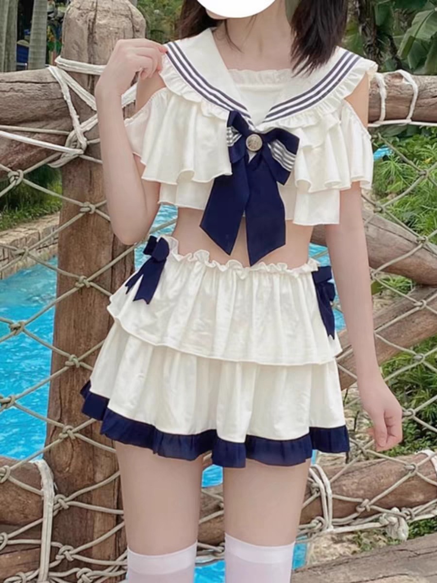 【激安本日限定】韓国レディース水着 Dawn Navy 水着 スプリットスーツ ソフトガール キュートなボウスカート 胸パッド付き水着