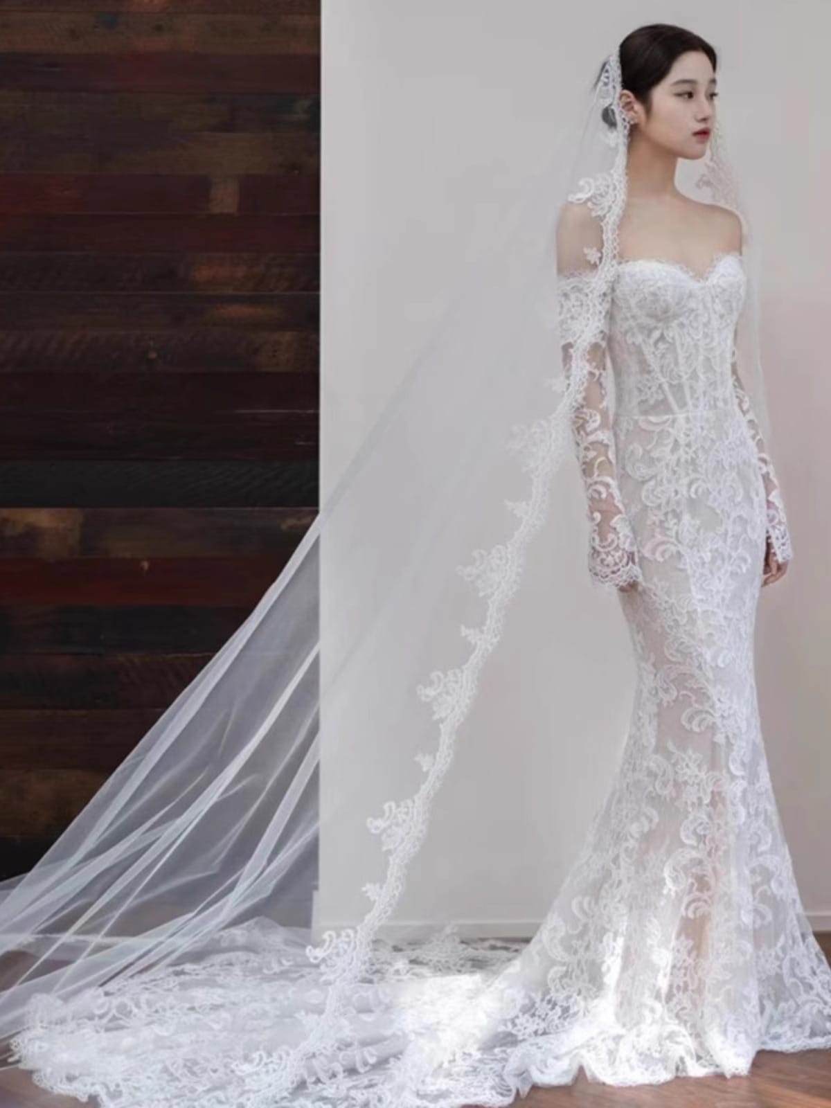 一文字肩の軽いウェディングドレス魚の尾の白い痩せた長袖冬の花嫁結婚迎賓の簡単な旅韓国式迎賓の紗を撮る