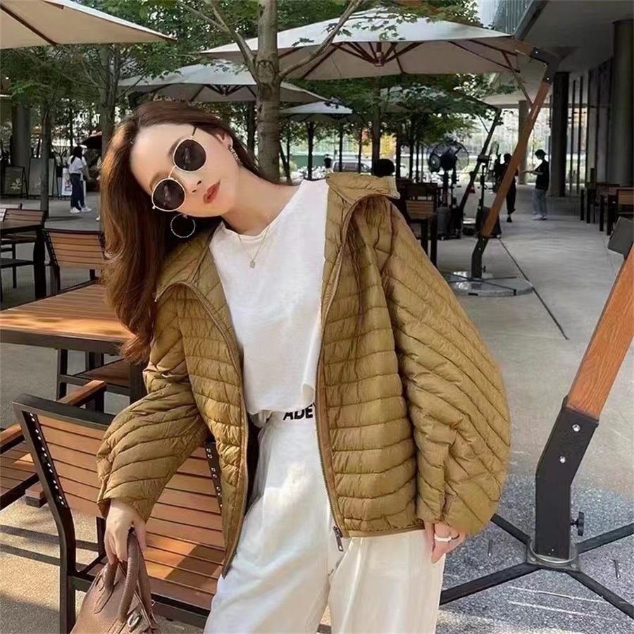 2025冬の軽薄ダウンジャケット女性ショートモデル新型韓国版シンプル横格連帽保温白鴨パイルゆるい潮