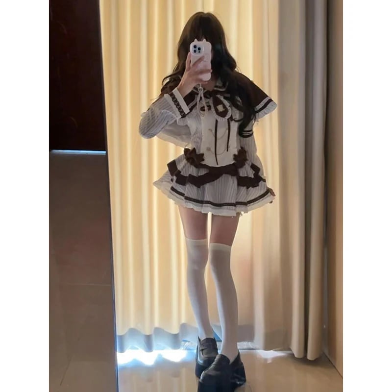 キュートなケープウエストを絞った蝶ネクタイのトップススリミングケーキスカートの春と秋にぴったりの甘くてガーリーな3点セット