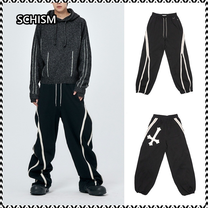 SCHISM CURVED ZIPPER SWEATPANTS