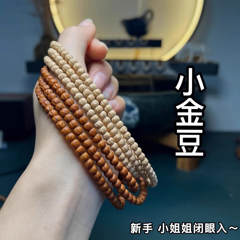 熱振百香籽コレクターグレードブレスレットチベット風ストレートカット深溝高突起鬼顔模様多角形滑らかな質感の小金豆ブレスレット