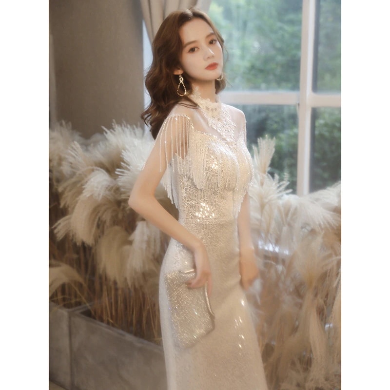 ワンピースドレスドレス女性のための宴会ドレス2025秋のドレスエレガントな気質ホストタッセルドレス長色