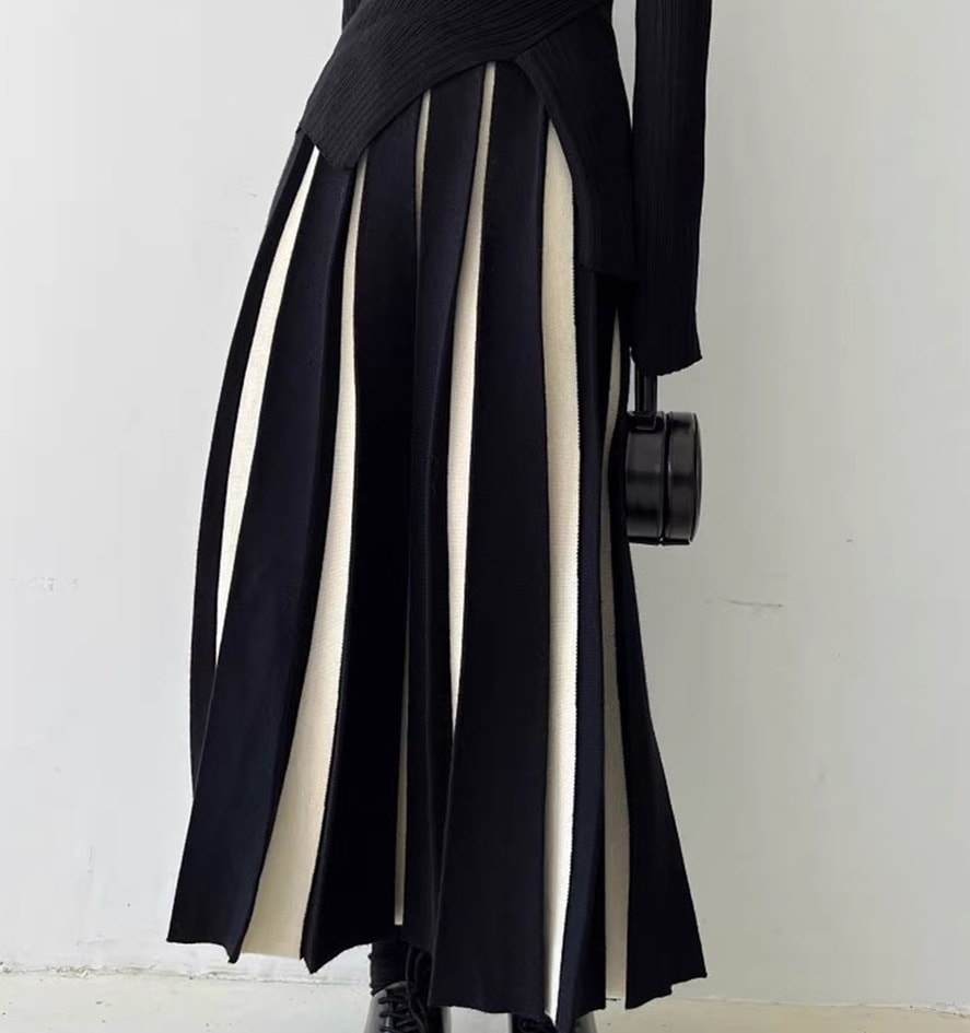 ニットスカート プリーツスカート プリーツ スカート ストライプ カラーブロッキング 黒 白 韓国 レディース オルチャン ボトムス ミモレ ミモレ丈 フレア セミフレア Aライン ボーダー