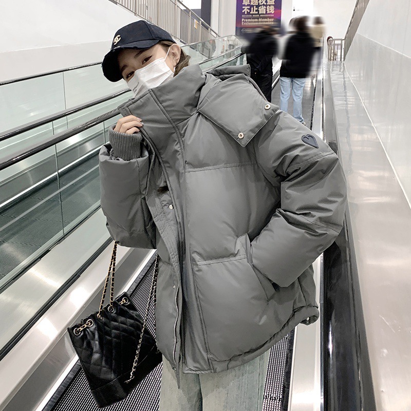 2024グレーラブショートダウンジャケット男性と女性のカップルはカジュアルな肥厚ニッチブレッド冬のジャケットの韓国語版