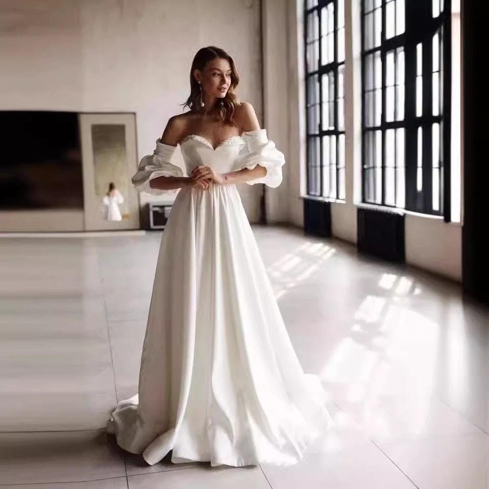 サテンの主なウェディングドレス春の新型欧米の気質は胸を拭きます