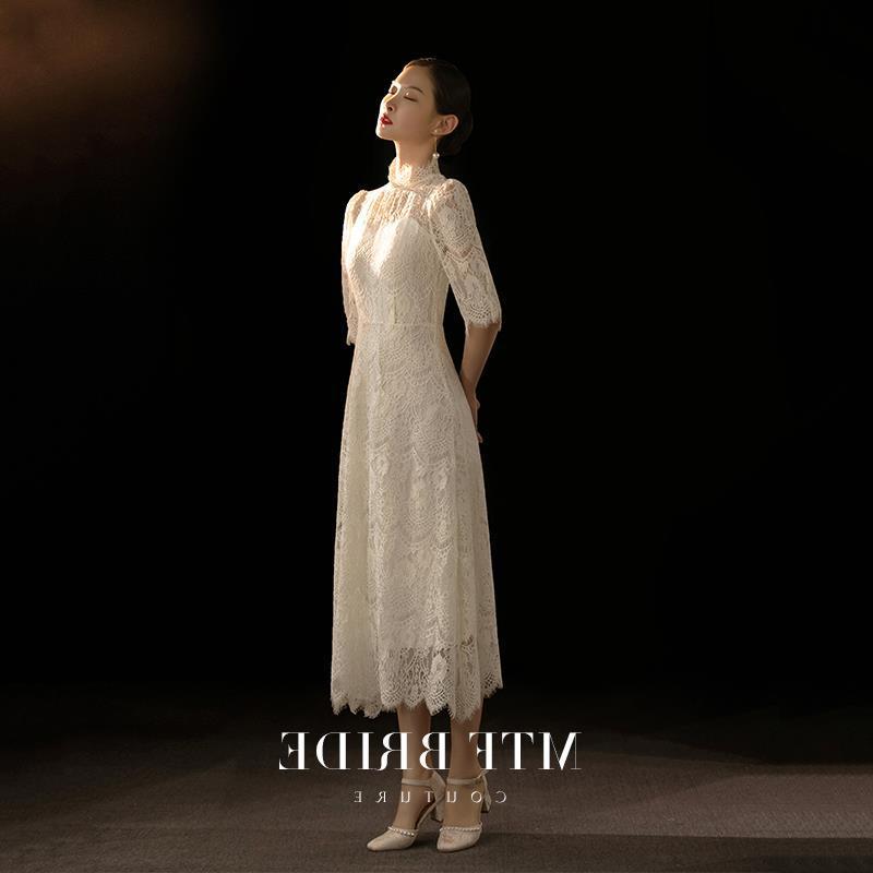 白いスカートの春の新型の登録ドレスは普段は日常の復古の軽いウェディングドレスを着ることができます