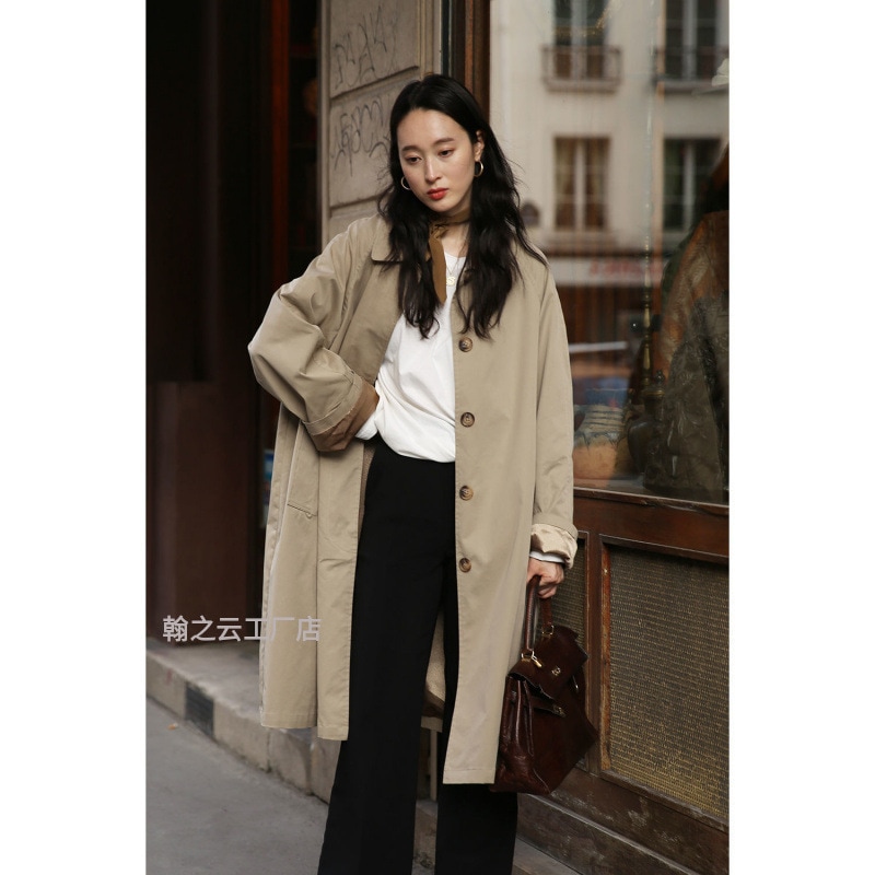 ウインドブレーカーミドル丈の女性の 2025 春と秋の新しい韓国スタイルのファッショナブルなラペルプロファイルラグランスリーブの女性のジャケットトレンディな