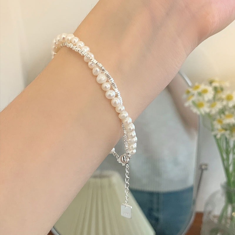 925スターリングシルバーの重工業の真珠は銀のビーズのブレスレットの女性の軽い贅沢なニッチの繊細なビーズを押しつぶした