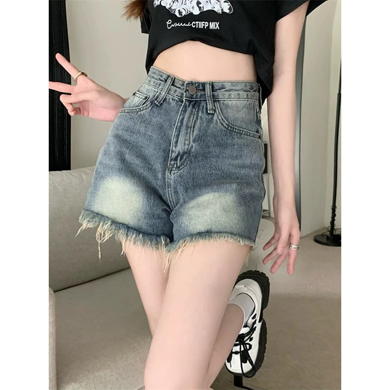 女性のためのレトロなプチデニムショートパンツ新しい夏のスタイルホットガールのハイウエストのルーズAラインのほつれた裾のホットパンツ