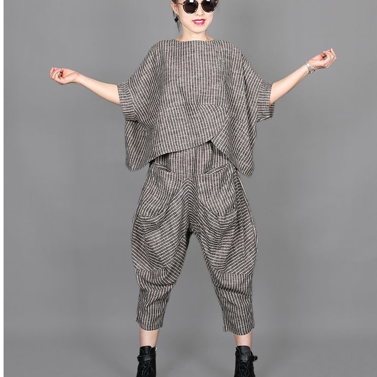 2点セット セットアップ 半袖 Tシャツ アシンメトリー プルオーバー ミディアム丈 クロップドパンツ ポケット かわいい 大人可愛い きれいめ シンプル 上品 おしゃれ かっこいい カジュアル 5,111円