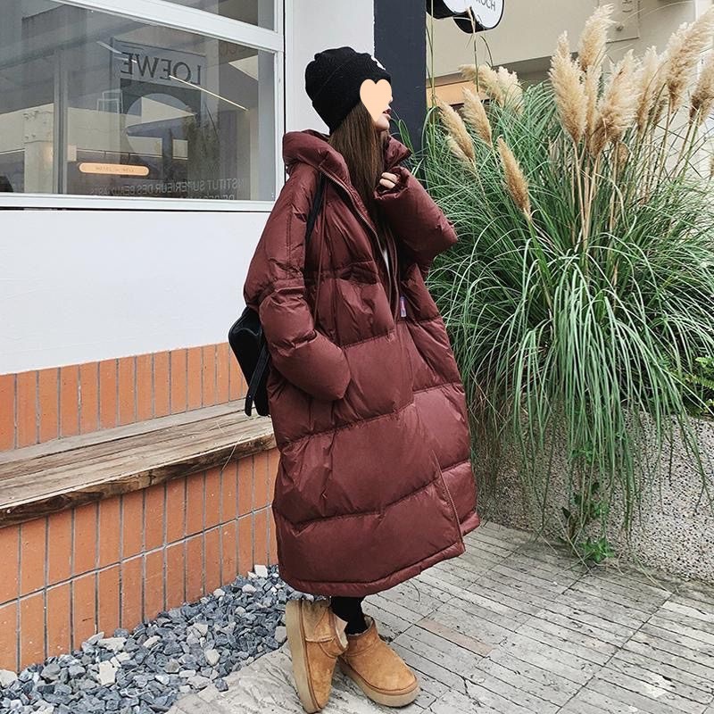 おっぱいがフサフサのダウンジャケット女中長は厚手の白いアヒルの綿毛のコートが流行している