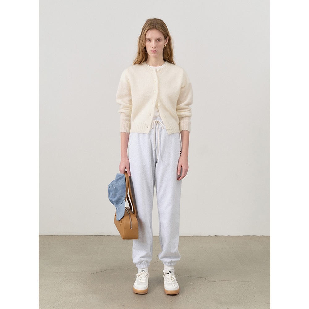 ダンスト女性用ユニセックスレザーロゴスウェットパンツライトメランジグレー UDPA4C101G1