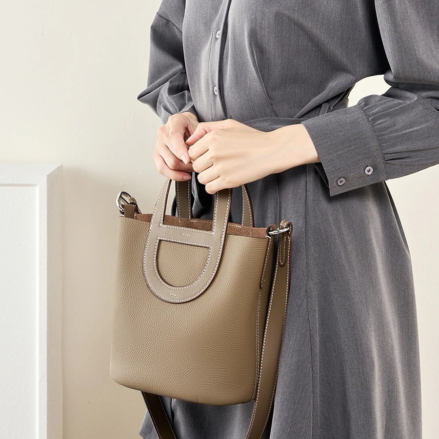 秋冬 ショルダーバッグ レディースファッション牛革バッグ バケットバッグ 豚鼻クロスボディハンドバッグ 大容量 斜め掛け