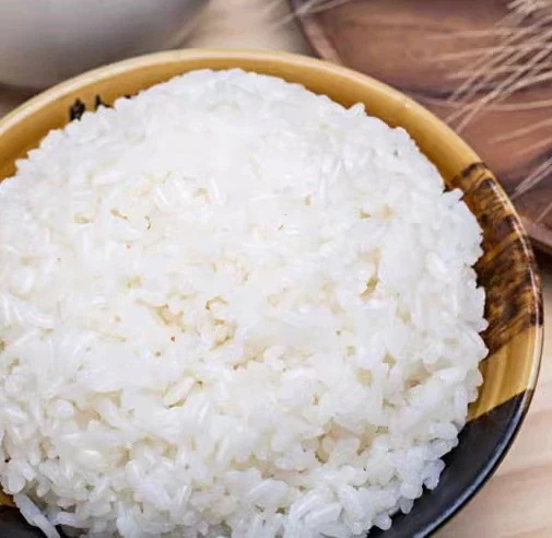 チョッキ着小花キャミソールの外にゆったりとしたノースリーブのTシャツの上着を着る