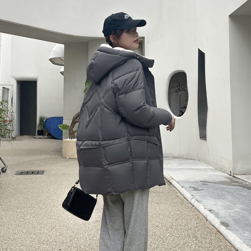2023年秋冬新型ダウンジャケット女性韓国版ファッションウエスト中の長柄フード付き90白鴨パイル厚手コート