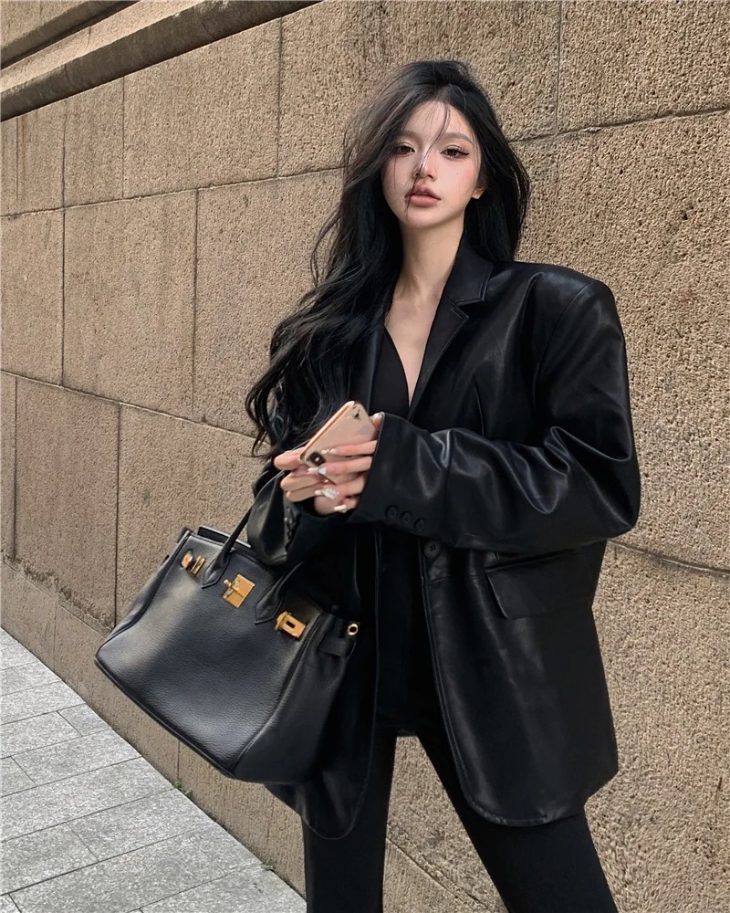 女性用オートバイレザージャケット2023年秋の新しいニッチデザインユニークでシックなスーツジャケット長袖トップ