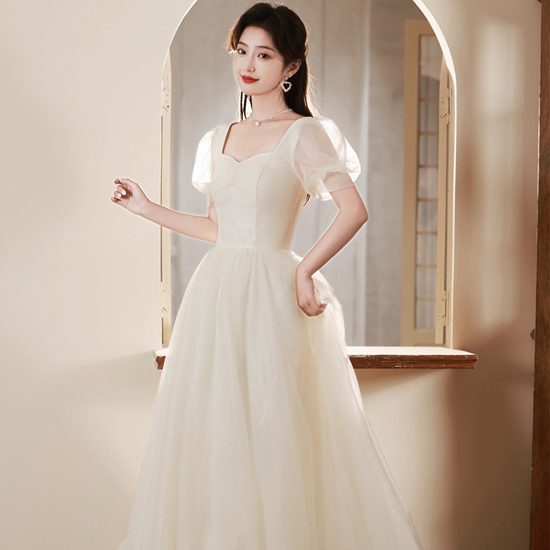 シャンパン色のドレススカート女性2024新司会者宴会高級感成人礼芸考ワンピースフランス