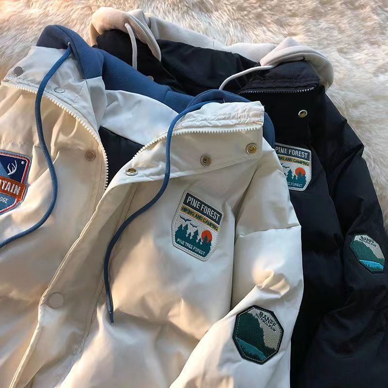 Ins スタイルの女性用偽ツーピース綿入りコート厚いフード付きコートゆったりショートカップル着用綿入りジャケットパンスーツ