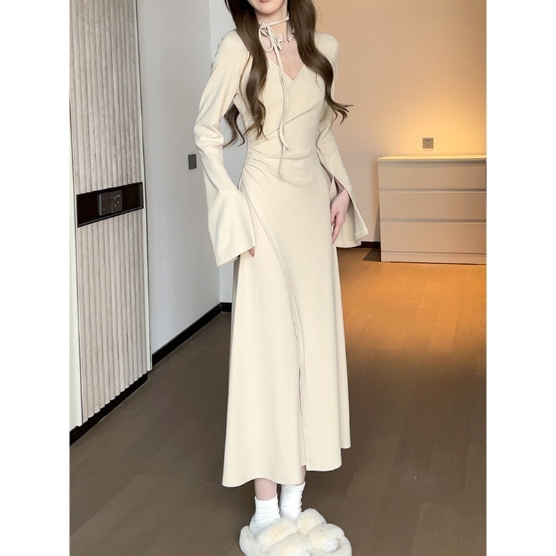 春と秋の女性のための優しくセクシーなvネックニットワンピース新しい気質痩身ウエストバッグヒップストラップロングスカート