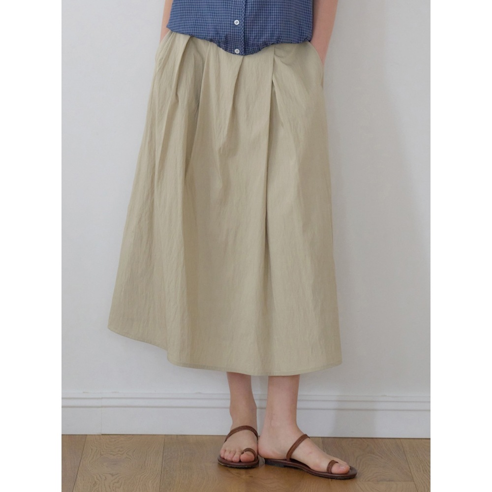 NILBY P ナチュラルフルイドフレアスカートベージュ