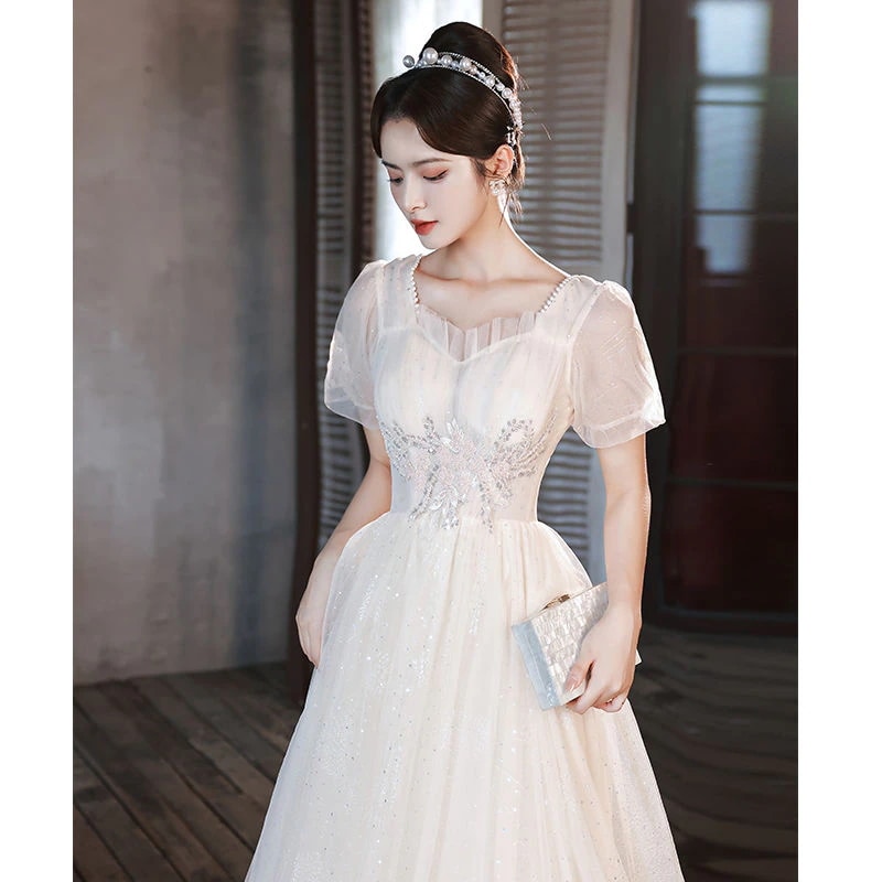 シャンパンカラーイブニングドレスレディース新しいスタイルライト高級ニッチハイエンド芸術試験妖精気質宴会ホスト長さ30%制限