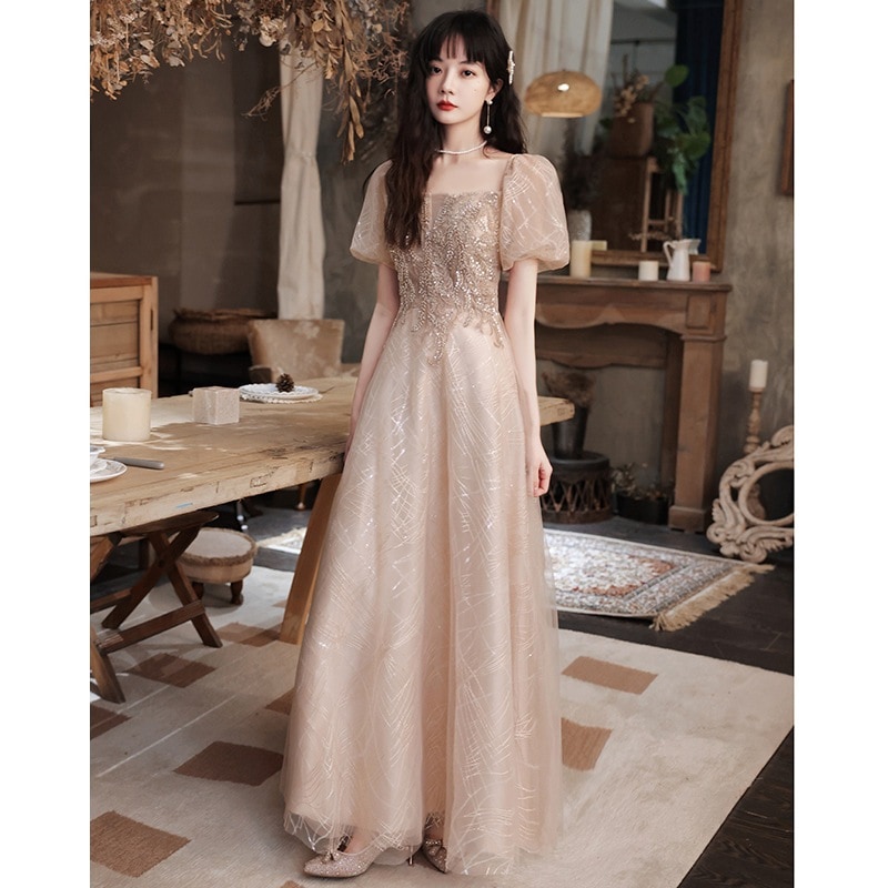 三七節です コンサート 公式の場です 卒業式 シャンパンイブニングドレス女性の新しいニッチ逃亡者プリンセススタイルホスト成人式ドレス