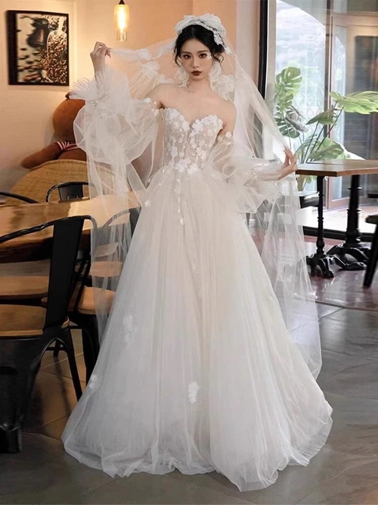 軽いウェディングドレス花嫁ハイエンドセンスウェディングモーニンブアンドウェルカムヤーンスーパーアウトドア芝生ウェディングパフスリーブワンピースドレスドレス