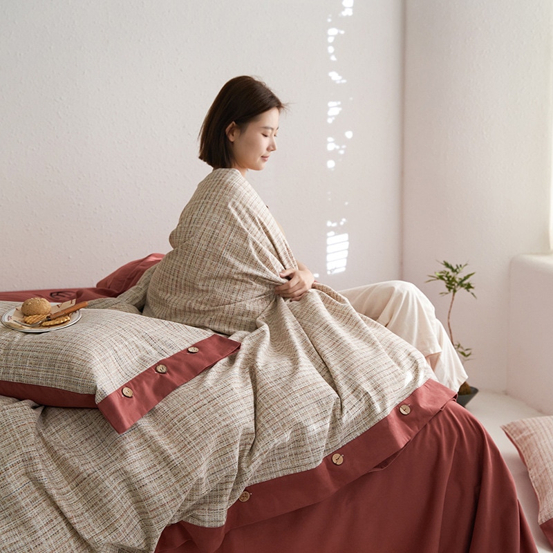 秋冬の新綿綿は厚くて毛を磨く4セットの綿ボタンのベッド用品100綿シーツ布団カバー