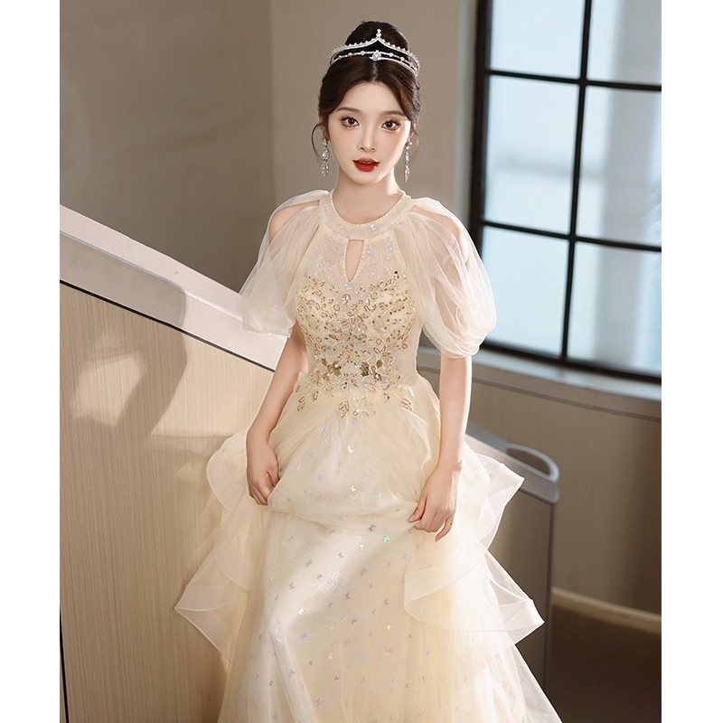 女性用シャンパンイブニングドレス2025新しいスタイルホルターネックハイエンドライトラグジュアリーニッチハイエンドアート宴会ホスト 12,533円