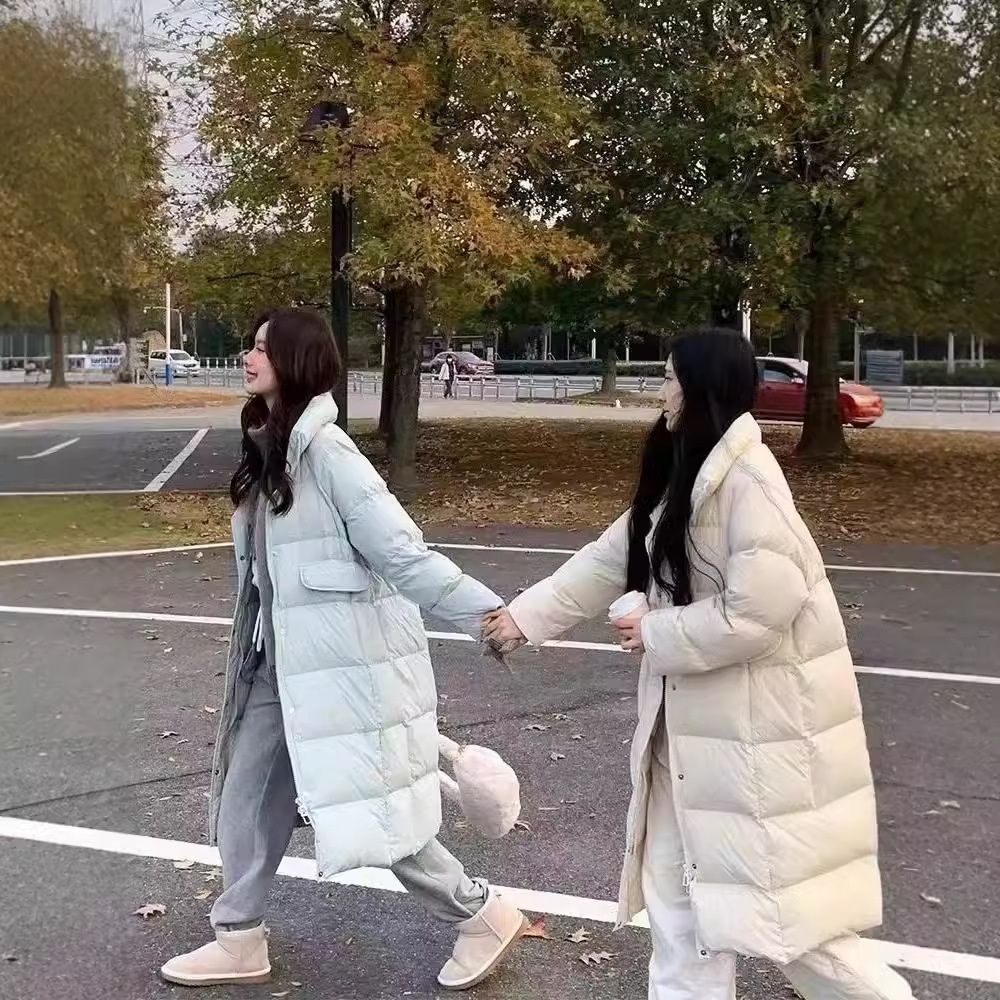 レディースミドル丈ダウンジャケット韓国風スタンドカラー膝上2025年秋冬新作厚手おしゃれハイエンドコートトレンド