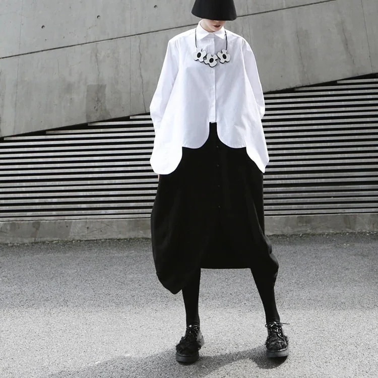 トップスシャツブラウス2025春装小群金不規則円弧超幅裾白いシャツ女性ゆるいシャツ女性1045