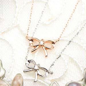 天然ダイヤモンド　リボンモチーフペンダントネックレス　宝石鑑別書カード 10Kホワイトゴールド