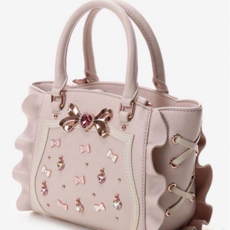 甘い地雷系バッグ女性の新しいかわいいlolitaハンドバッグ宝石ハスの葉の縁蝶ネクタイシングル肩斜めバッグ
