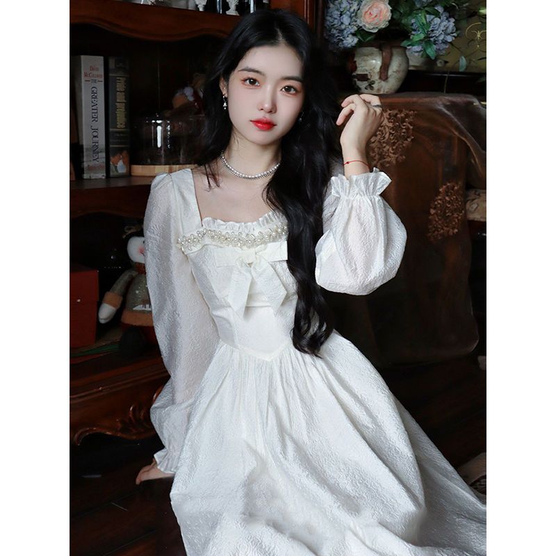 新作登場白いリボンのプリンセスドレスのフレンチウエストワンピはミドル丈